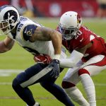 Arizona Cardinals defensive back Tramaine Brock (20) tackles Los Angeles Rams tight end Tyler Higbee (89) during the first half of an NFL football game, Sunday, Dec. 1, 2019, in Glendale, Ariz. (AP Photo/Rick Scuteri)