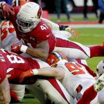Arizona Cardinals running back Kenyan Drake (41) dives into the end zone for the touchdown against the Cleveland Browns during the first half of an NFL football game, Sunday, Dec. 15, 2019, in Glendale, Ariz. (AP Photo/Ross D. Franklin)