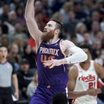 Phoenix Suns center Aron Baynes shoots against the Portland Trail Blazers during the second half of an NBA basketball game in Portland, Ore., Monday, Dec. 30, 2019. (AP Photo/Craig Mitchelldyer)