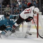 Arizona Coyotes' Derek Stepan (21) scores a goal past San Jose Sharks' Dylan Gambrell (7) and goalie Aaron Dell, second from left, in the second period of an NHL hockey game, Tuesday, Dec. 17, 2019, in San Jose, Calif. (AP Photo/Ben Margot)