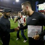 Pittsburgh Steelers head coach Mike Tomlin, left, greets Arizona Cardinals head coach Kliff Kingsbury after an NFL football game, Sunday, Dec. 8, 2019, in Glendale, Ariz. The Steelers won 23-17. (AP Photo/Ross D. Franklin)