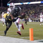Oregon wide receiver Jaylon Redd (30) is pushed out of bounds by Utah defensive back Josh Nurse (14) short of the goal line during the first half of the Pac-12 Conference championship NCAA college football game in Santa Clara, Calif., Friday, Dec. 6, 2018. (AP Photo/Tony Avelar)
