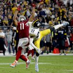 Pittsburgh Steelers cornerback Steven Nelson (22) breaks up a pass to Arizona Cardinals wide receiver Larry Fitzgerald (11) during the second half of an NFL football game, Sunday, Dec. 8, 2019, in Glendale, Ariz. The Steelers won 23-17. (AP Photo/Ross D. Franklin)