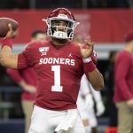 Oklahoma quarterback Jalen Hurts warms up before an NCAA college football game against Baylor at the Big 12 Conference championship, Saturday, Dec. 7, 2019, in Arlington, Texas. (AP Photo/Jeffrey McWhorter)