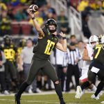 Oregon quarterback Justin Herbert throws a pass against Utah during the first half of the Pac-12 Conference championship NCAA college football game in Santa Clara, Calif., Friday, Dec. 6, 2018. (AP Photo/Tony Avelar)