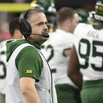 Baylor head coach Matt Rhule watches from the sidelines during a timeout in the first half of an NCAA college football game against Oklahoma for the Big 12 Conference championship, Saturday, Dec. 7, 2019, in Arlington, Texas. (AP Photo/Jeffrey McWhorter)