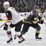 Arizona Coyotes defenseman Jakob Chychrun (6) and Vegas Golden Knights center Jonathan Marchessault look for the puck during the second period of an NHL hockey game Saturday, Dec. 28, 2019, in Las Vegas. (AP Photo/David Becker)
