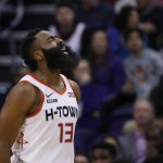Houston Rockets guard James Harden celebrates one of his three-point baskets against the Phoenix Suns during the second half of an NBA basketball game Saturday, Dec. 21, 2019, in Phoenix. (AP Photo/Ross D. Franklin)