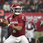 Oklahoma quarterback Jalen Hurts looks to pass against Baylor during the first half of an NCAA college football game for the Big 12 Conference championship, Saturday, Dec. 7, 2019, in Arlington, Texas. (AP Photo/Jeffrey McWhorter)