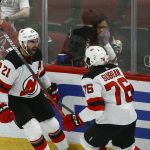 New Jersey Devils right wing Kyle Palmieri (21) celebrates his goal against the Arizona Coyotes with Devils defenseman P.K. Subban (76) during the third period of an NHL hockey game, Saturday, Dec. 14, 2019, in Glendale, Ariz. The Devils defeated the Coyotes 2-1. (AP Photo/Ross D. Franklin)