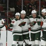 Minnesota Wild center Ryan Donato (6) celebrates his goal against the Arizona Coyotes with right wing Mats Zuccarello (36), defenseman Jared Spurgeon (46), defenseman Ryan Suter (20) and center Eric Staal (12) during the second period of an NHL hockey game Thursday, Dec. 19, 2019, in Glendale, Ariz. (AP Photo/Ross D. Franklin)