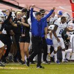 Air Force head coach Troy Calhoun celebrates after defeating Washington State 31-21 during the Cheez-It Bowl NCAA college football game, Friday, Dec. 27, 2019, in Phoenix. (AP Photo/Rick Scuteri)