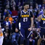 Denver Nuggets guard Jamal Murray (27) reacts after making the game winning basket against the Phoenix Suns in the second half during an NBA basketball game, Monday, Dec. 23, 2019, in Phoenix. The Nuggets defeated the Suns 113-111. (AP Photo/Rick Scuteri)