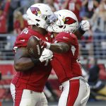 Arizona Cardinals running back Kenyan Drake, right, celebrates his touchdown against the Cleveland Browns with Arizona Cardinals wide receiver Damiere Byrd during the first half of an NFL football game, Sunday, Dec. 15, 2019, in Glendale, Ariz. (AP Photo/Rick Scuteri)
