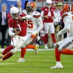 Arizona Cardinals quarterback Kyler Murray (1) scrambles as Cleveland Browns defensive end Chad Thomas defends during the first half of an NFL football game, Sunday, Dec. 15, 2019, in Glendale, Ariz. (AP Photo/Rick Scuteri)