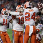 Clemson safety Nolan Turner (24) celebrates after his interception against Ohio State in the final minute of the Fiesta Bowl NCAA college football playoff semifinal Saturday, Dec. 28, 2019, in Glendale, Ariz. (AP Photo/Rick Scuteri)