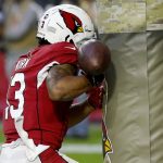 Arizona Cardinals wide receiver Christian Kirk (13) runs into the goal post on an incomplete pass during the second half of an NFL football game against the Los Angeles Rams, Sunday, Dec. 1, 2019, in Glendale, Ariz. The Rams won 34-7. (AP Photo/Rick Scuteri)