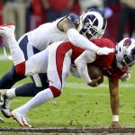 Arizona Cardinals quarterback Kyler Murray, right, is sacked by Los Angeles Rams defensive end Michael Brockers during the second half of an NFL football game, Sunday, Dec. 1, 2019, in Glendale, Ariz. (AP Photo/Ross D. Franklin)