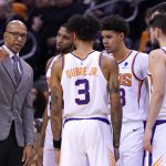 Phoenix Suns head coach Monty Williams talks to his team during a timeout in the first half during an NBA basketball game against the Denver Nuggets, Monday, Dec. 23, 2019, in Phoenix. (AP Photo/Rick Scuteri)