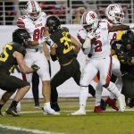 Utah running back Zack Moss (2) breaks a tackle for a touchdown run against Oregon during the second half of the Pac-12 Conference championship NCAA college football game in Santa Clara, Calif., Friday, Dec. 6, 2018. (AP Photo/Tony Avelar)