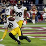 Pittsburgh Steelers outside linebacker T.J. Watt (90) celebrates his interception in the end zone against the Arizona Cardinals during the second half of an NFL football game, Sunday, Dec. 8, 2019, in Glendale, Ariz. (AP Photo/Rick Scuteri)