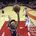 Phoenix Suns' Kelly Oubre Jr. (3) shoots against the Houston Rockets during the first half of an NBA basketball game Saturday, Dec. 7, 2019, in Houston. (AP Photo/David J. Phillip)