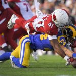 Los Angeles Rams safety Taylor Rapp recovers a fumble against Arizona Cardinals running back Kenyan Drake during first half of an NFL football game Sunday, Dec. 29, 2019, in Los Angeles. (AP Photo/Mark J. Terrill)