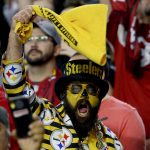 Pittsburgh Steelers fans cheer during the first half of an NFL football game against the Arizona Cardinals, Sunday, Dec. 8, 2019, in Glendale, Ariz. (AP Photo/Ross D. Franklin)