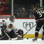 Chicago Blackhawks goaltender Robin Lehner (40) makes a save on a shot by Arizona Coyotes center Carl Soderberg (34) during the first period of an NHL hockey game Thursday, Dec. 12, 2019 in Glendale, Ariz. (AP Photo/Ross D. Franklin)