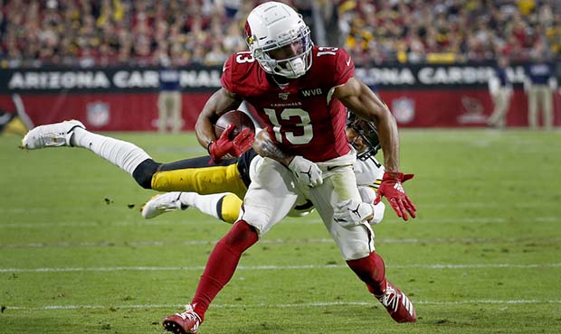 Arizona Cardinals wide receiver Christian Kirk (13) is tackled by Pittsburgh Steelers cornerback Jo...