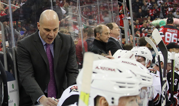 Rick Tocchet of the Arizona Coyotes handles bench duties during the game against the New Jersey Dev...