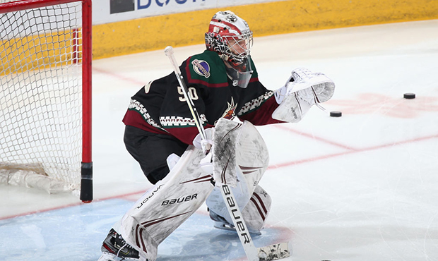 Goaltender Ivan Prosvetov #50 of the Arizona Coyotes warms up before the NHL game against the Pitts...