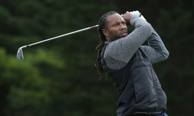 Larry Fitzgerald hits his tee shot on the 5th hole during Round One of the AT&T Pebble Beach Pr...