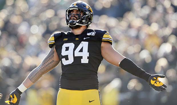 Iowa defensive end A.J. Epenesa celebrates during the second half of an NCAA college football game ...