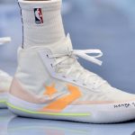 Phoenix Suns forward Kelly Oubre Jr. wears shoes with a tribute message to the late Kobe Bryant in the first half of an NBA basketball game against the Memphis Grizzlies, Sunday, Jan. 26, 2020, in Memphis, Tenn. (AP Photo/Brandon Dill)