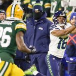 Seattle Seahawks' Tyler Lockett catches a pass during the first half of an NFL divisional playoff football game against the Green Bay Packers Sunday, Jan. 12, 2020, in Green Bay, Wis. (AP Photo/Matt Ludtke)
