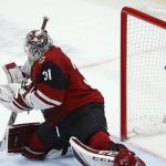 Arizona Coyotes goaltender Adin Hill gives up the winning goal to Los Angeles Kings' Alex Iafallo during overtime of an NHL hockey game Thursday, Jan. 30, 2020, in Glendale, Ariz. The Kings won 3-2. (AP Photo/Ross D. Franklin)