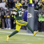 Green Bay Packers' Davante Adams runs to the endzone for his touchdown catch during the second half of an NFL divisional playoff football game against the Seattle Seahawks Sunday, Jan. 12, 2020, in Green Bay, Wis. (AP Photo/Darron Cummings)