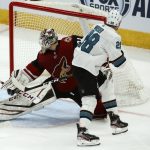 San Jose Sharks right wing Timo Meier (28) scores a goal against Arizona Coyotes goaltender Adin Hill, left, during the second period of an NHL hockey game Tuesday, Jan. 14, 2020, in Glendale, Ariz. (AP Photo/Ross D. Franklin)