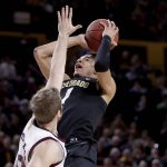 Colorado guard Tyler Bey (1) shoots over Arizona State forward Mickey Mitchell during the first half of an NCAA college basketball game, Thursday, Jan. 16, 2020, in Tempe, Ariz. (AP Photo/Matt York)
