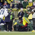 Green Bay Packers' Davante Adams catches a touchdown pass during the first half of an NFL divisional playoff football game against the Seattle Seahawks Sunday, Jan. 12, 2020, in Green Bay, Wis. (AP Photo/Darron Cummings)