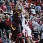 Arizona State guard Rob Edwards, left, shoots over Washington State guard Isaac Bonton during the first half of an NCAA college basketball game in Pullman, Wash., Wednesday, Jan. 29, 2020. (AP Photo/Young Kwak)