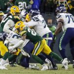 Green Bay Packers' Jaire Alexander sacks Seattle Seahawks quarterback Russell Wilson on a two-point conversion attempt during the second half of an NFL divisional playoff football game Sunday, Jan. 12, 2020, in Green Bay, Wis. (AP Photo/Matt Ludtke)