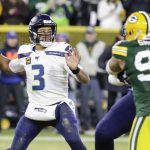 Seattle Seahawks' Russell Wilson throws during the first half of an NFL divisional playoff football game against the Green Bay Packers Sunday, Jan. 12, 2020, in Green Bay, Wis. (AP Photo/Darron Cummings)