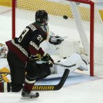 Arizona Coyotes defenseman Oliver Ekman-Larsson (23) has his shot blocked by a kick save from Pittsburgh Penguins goaltender Tristan Jarry (35) during the third period of an NHL hockey game Sunday, Jan. 12, 2020, in Glendale, Ariz. The Penguins defeated the Coyotes 4-3 in a shootout. (AP Photo/Ross D. Franklin)