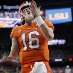 Clemson quarterback Trevor Lawrence celebrates after scoring during the first half of a NCAA College Football Playoff national championship game against LSU Monday, Jan. 13, 2020, in New Orleans. (AP Photo/Gerald Herbert)