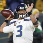 Seattle Seahawks quarterback Russell Wilson warms up before an NFL divisional playoff football game against the Green Bay Packers Sunday, Jan. 12, 2020, in Green Bay, Wis. (AP Photo/Matt Ludtke)