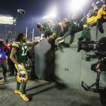 Green Bay Packers' Davante Adams celebrates with fans after an NFL divisional playoff football game against the Seattle Seahawks Sunday, Jan. 12, 2020, in Green Bay, Wis. The Packers won 28-23 to advance to the NFC Championship. (AP Photo/Mike Roemer)