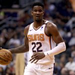 Phoenix Suns center Deandre Ayton (22) moves the ball during the second half of an NBA basketball game against the Indiana Pacers, Wednesday, Jan. 22, 2020, in Phoenix. (AP Photo/Matt York)