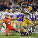 LSU safety Grant Delpit, right, breaks up a pass intended for Clemson wide receiver Tee Higgins during the first half of a NCAA College Football Playoff national championship game Monday, Jan. 13, 2020, in New Orleans. (AP Photo/David J. Phillip)
